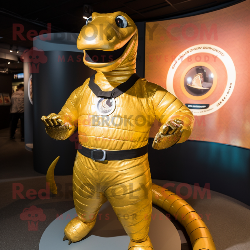 Gold Titanoboa mascot costume character dressed with a Rash Guard and Rings
