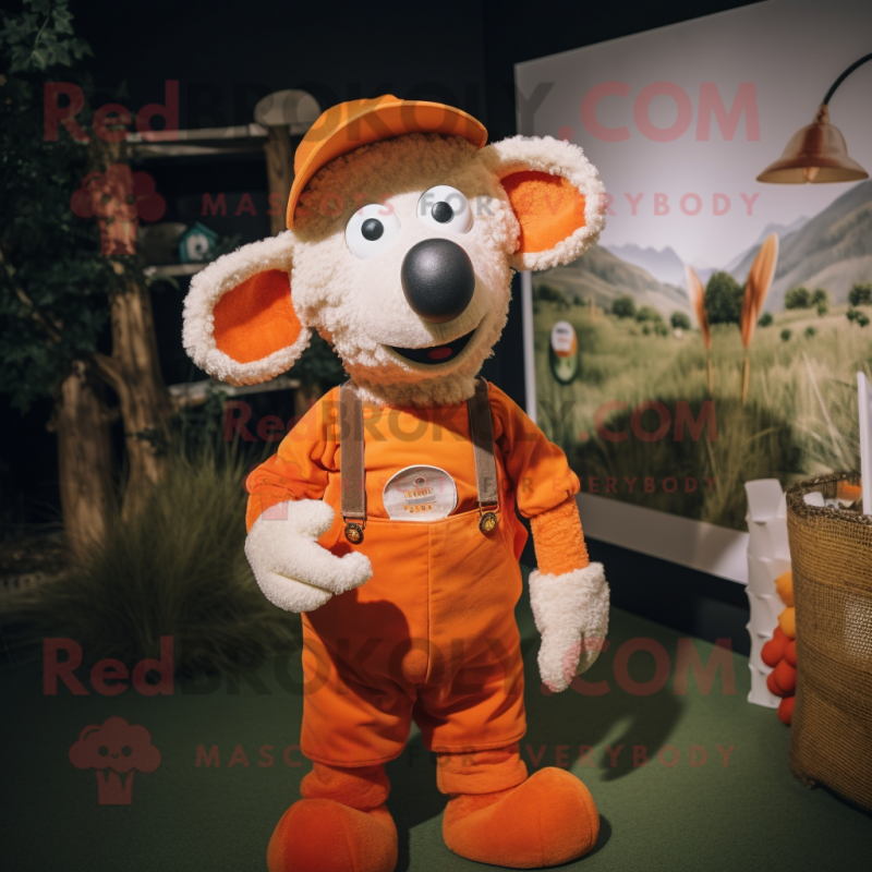 Orange Sheep mascot costume character dressed with a Dungarees and Hat pins