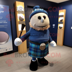 Blue Bagpipe mascot costume character dressed with a Sweater and Ties