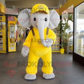 Lemon Yellow Elephant mascot costume character dressed with a Dungarees and Belts