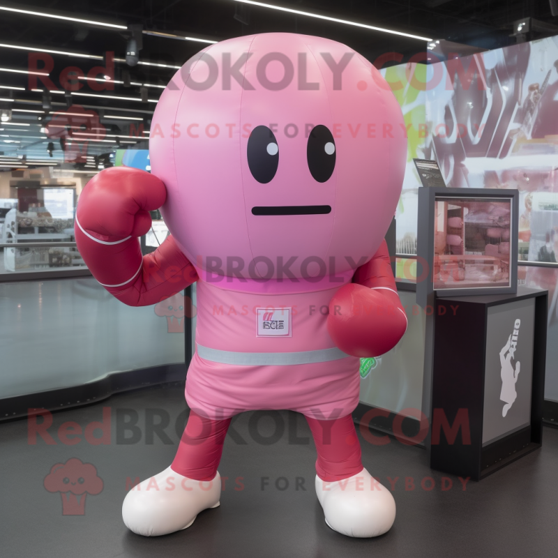 Pink Boxing Glove mascot costume character dressed with a Tank Top and Keychains Pink Boxing Glove mascot costume character dressed with a Tank Top and Keychains