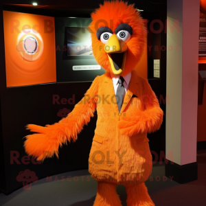 Orange Emu mascot costume character dressed with a Suit Pants and Cummerbunds