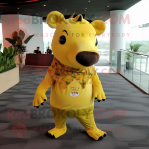 Yellow Tapir mascot costume character dressed with a Skinny Jeans and Wraps