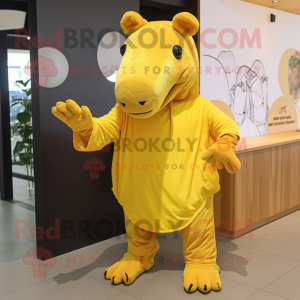 Yellow Tapir mascot costume character dressed with a Skinny Jeans and Wraps