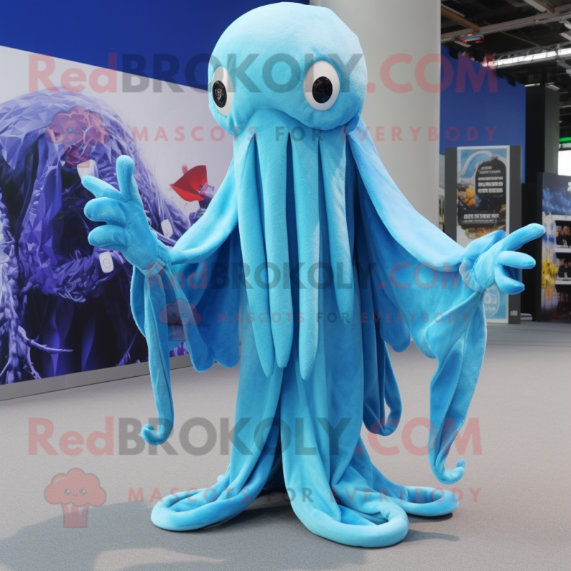 Sky Blue Kraken mascot costume character dressed with a Cover-up and Scarf clips Sky Blue Kraken mascot costume character dressed with a Cover-up and Scarf clips