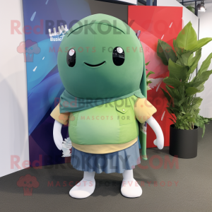 Olive Narwhal mascot costume character dressed with a Bermuda Shorts and Wraps