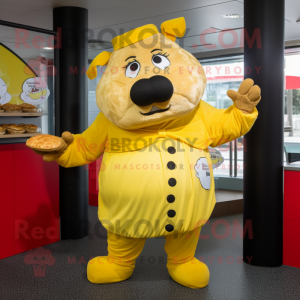 Yellow Beef Wellington mascot costume character dressed with a Jumpsuit and Brooches