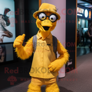 Yellow Emu mascot costume character dressed with a Skinny Jeans and Beanies