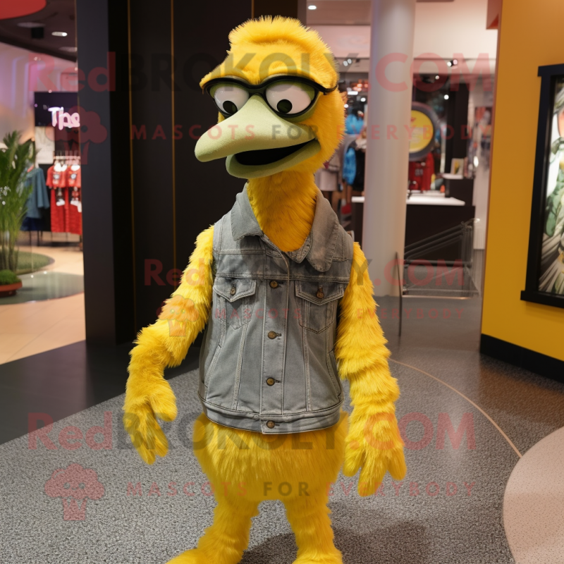 Yellow Emu mascot costume character dressed with a Skinny Jeans and Beanies Yellow Emu mascot costume character dressed with a Skinny Jeans and Beanies