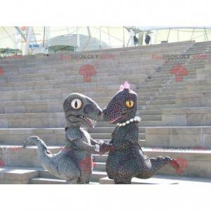 2 mascotte di dinosauro maculate in stile ghepardo -