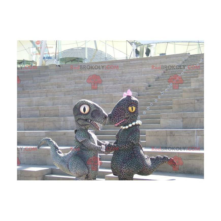 2 mascotte di dinosauro maculate in stile ghepardo - 2 mascotte di dinosauro maculate in stile ghepardo -
