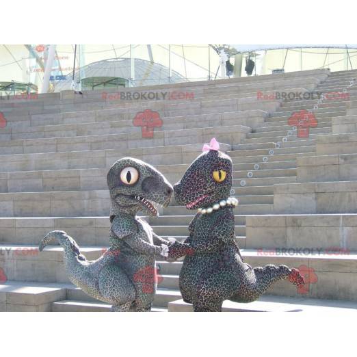 2 mascotas de dinosaurios de pareja manchada estilo guepardo -