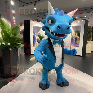 Sky Blue Triceratops mascot costume character dressed with a Tuxedo and Backpacks