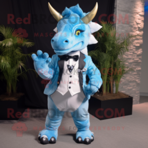 Sky Blue Triceratops mascot costume character dressed with a Tuxedo and Backpacks