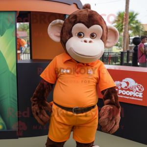 Rust Chimpanzee mascot costume character dressed with a Polo Shirt and Keychains