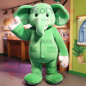 Green Elephant mascot costume character dressed with a Jeggings and Mittens