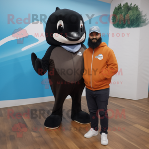 Brown Killer Whale mascot costume character dressed with a Sweatshirt and Pocket squares