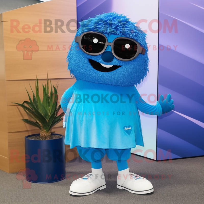 Blue Aglet mascot costume character dressed with a A-Line Skirt and Sunglasses