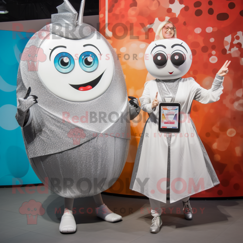 Silver Shakshuka mascot costume character dressed with a Shift Dress and Smartwatches