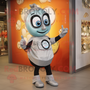 Silver Shakshuka mascot costume character dressed with a Shift Dress and Smartwatches