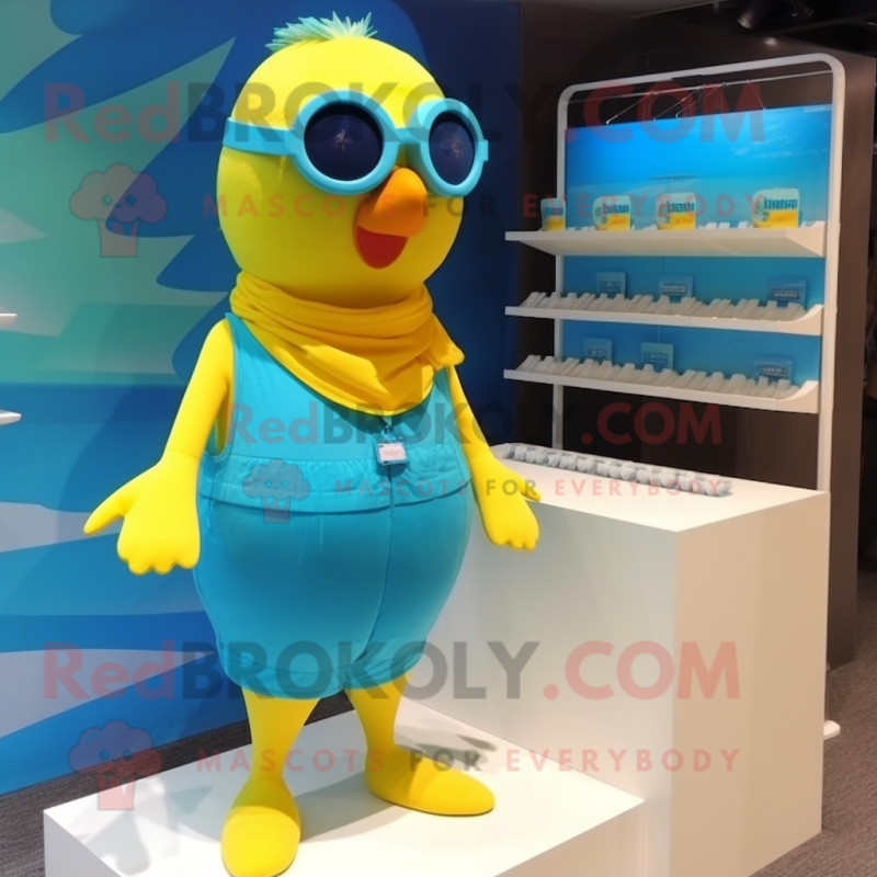 Cyan Canary mascot costume character dressed with a Swimwear and Sunglasses Cyan Canary mascot costume character dressed with a Swimwear and Sunglasses