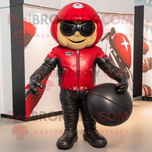 Red Rugby Ball mascot costume character dressed with a Biker Jacket and Wraps