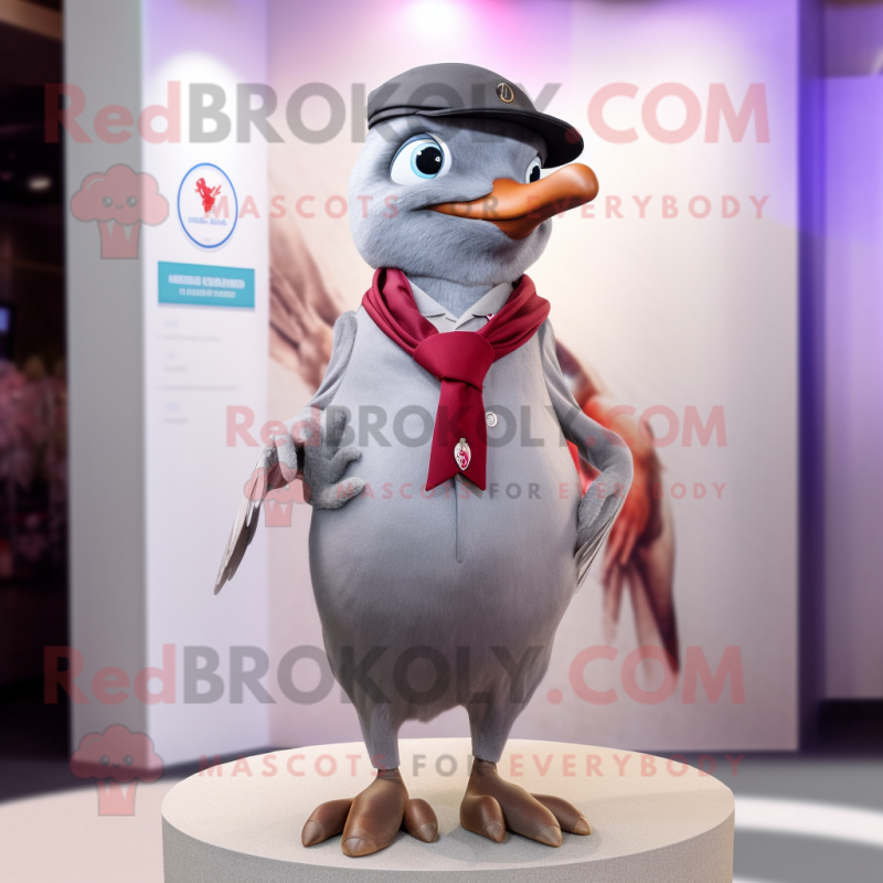 Gray Dove mascot costume character dressed with a Suit and Scarves Gray Dove mascot costume character dressed with a Suit and Scarves