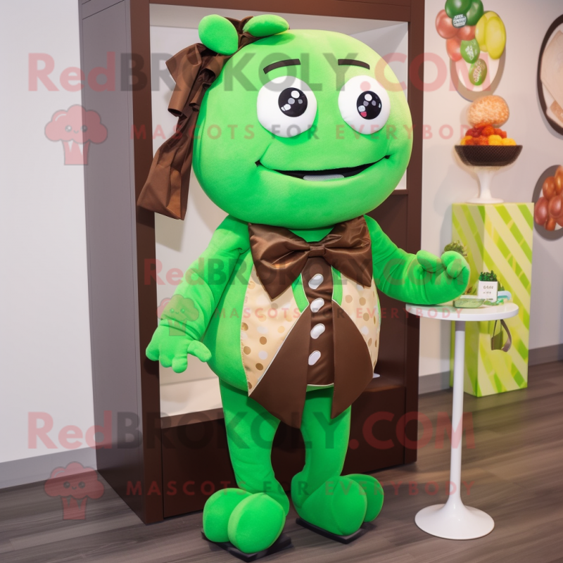 Green Chocolates mascot costume character dressed with a Romper and Bow ties Green Chocolates mascot costume character dressed with a Romper and Bow ties