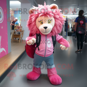 Pink Lion mascot costume character dressed with a Jeans and Backpacks