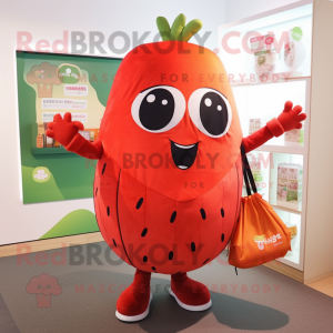 Red Melon mascot costume character dressed with a Graphic Tee and Tote bags