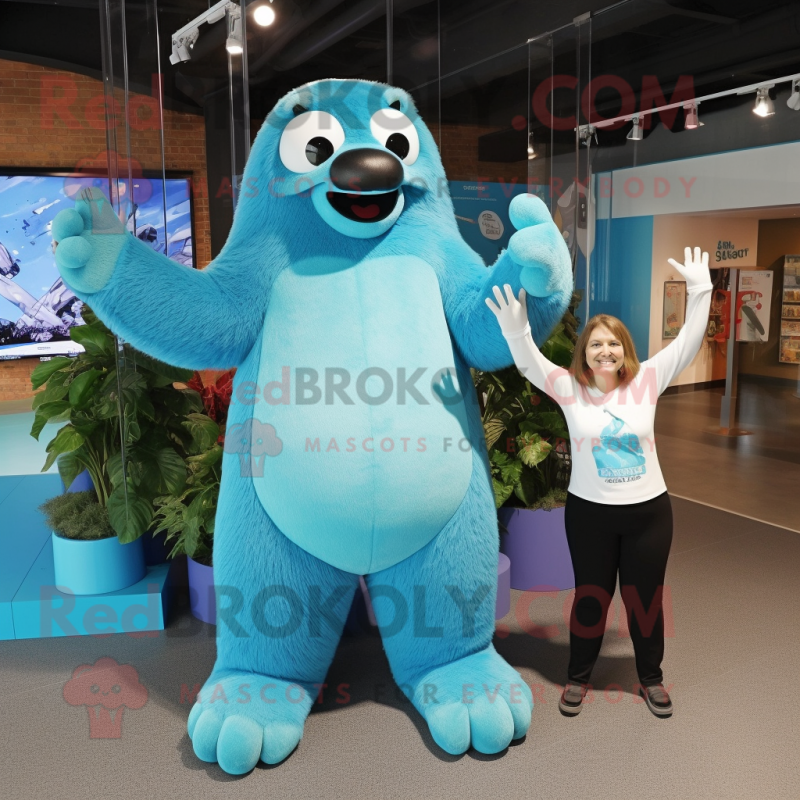 Cyan Giant Sloth mascot costume character dressed with a Mom Jeans and Ties Cyan Giant Sloth mascot costume character dressed with a Mom Jeans and Ties