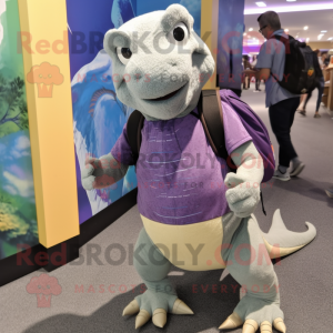Lavender Komodo Dragon mascot costume character dressed with a Wrap Skirt and Backpacks