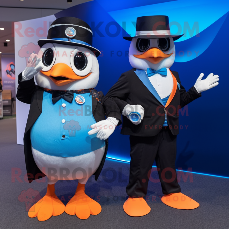 Blue Orange mascot costume character dressed with a Tuxedo and Smartwatches