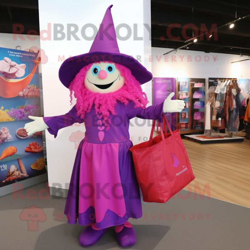 Magenta Witch mascot costume character dressed with a Long Sleeve Tee and Tote bags Magenta Witch mascot costume character dressed with a Long Sleeve Tee and Tote bags