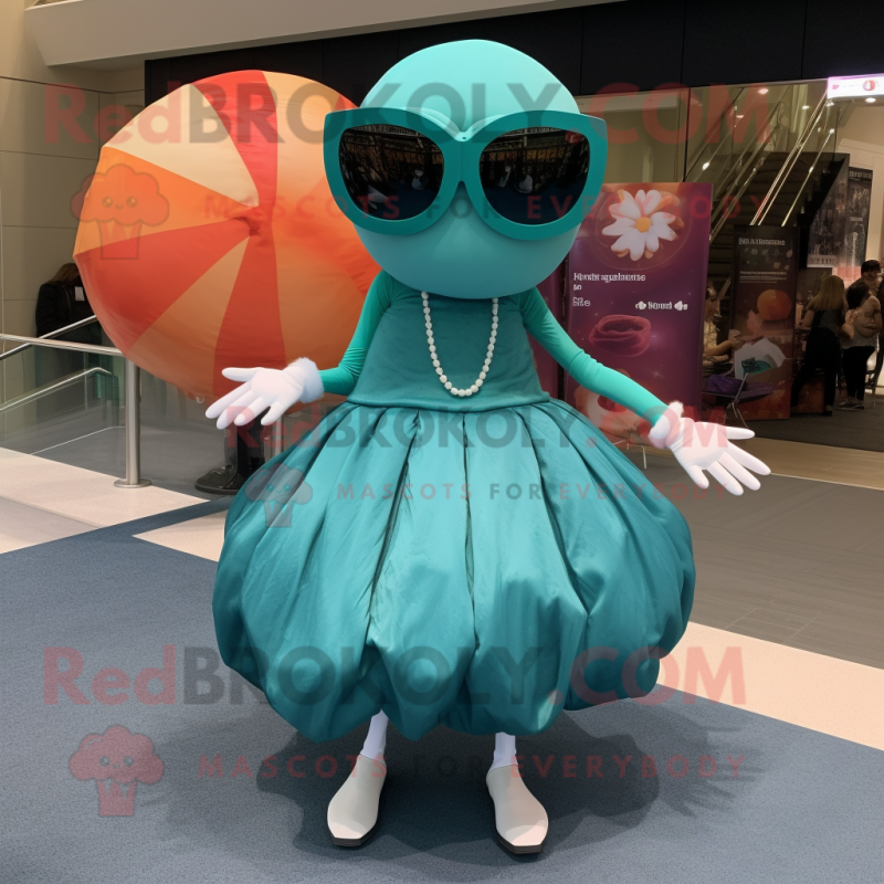 Teal Crab Cakes mascot costume character dressed with a Ball Gown and Sunglasses