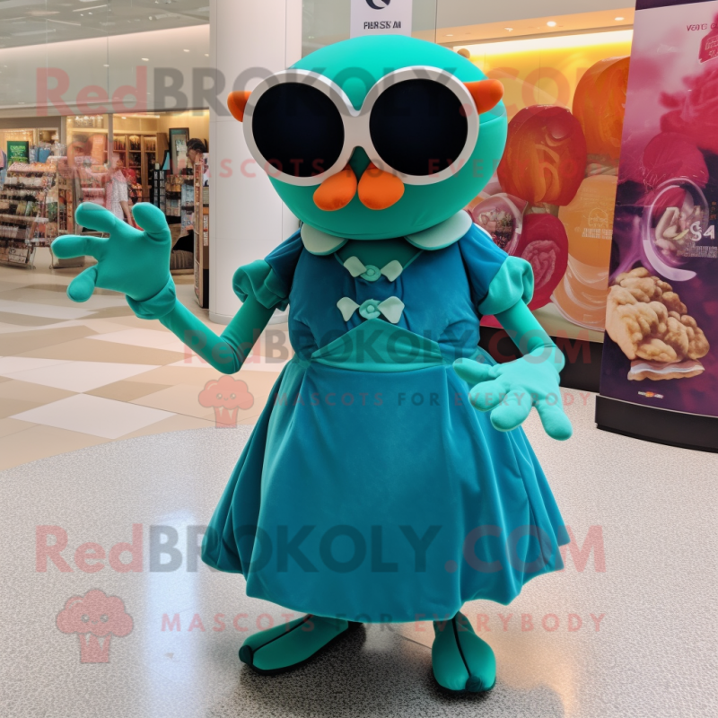 Teal Crab Cakes mascot costume character dressed with a Ball Gown and Sunglasses