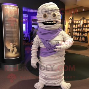 Lavender Mummy mascot costume character dressed with a T-Shirt and Lapel pins