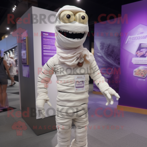 Lavender Mummy mascot costume character dressed with a T-Shirt and Lapel pins