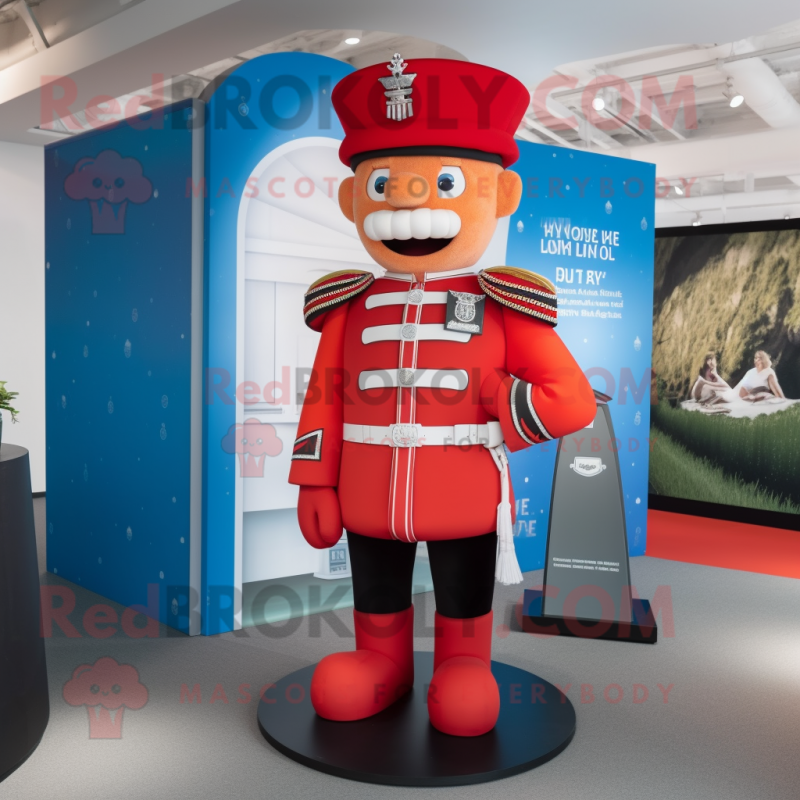 Red British Royal Guard mascot costume character dressed with a Swimwear and Backpacks Red British Royal Guard mascot costume character dressed with a Swimwear and Backpacks