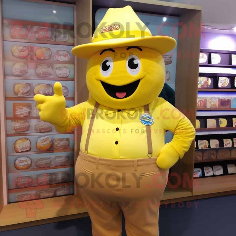 Yellow Chocolates mascot costume character dressed with a Oxford Shirt and Caps Yellow Chocolates mascot costume character dressed with a Oxford Shirt and Caps