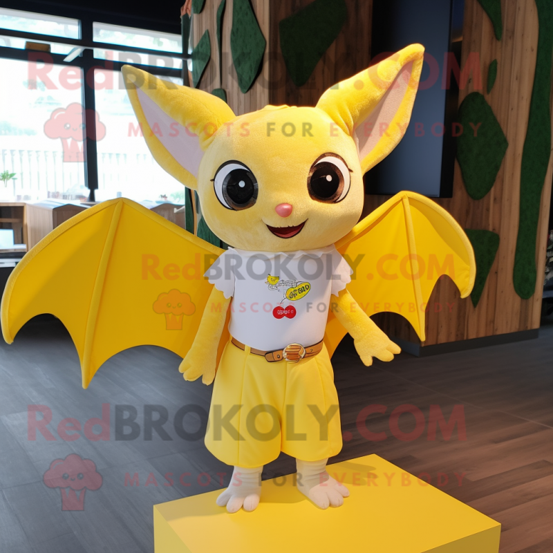 Lemon Yellow Bat mascot costume character dressed with a Blouse and Keychains