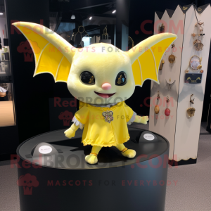Lemon Yellow Bat mascot costume character dressed with a Blouse and Keychains