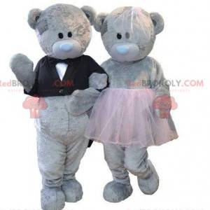 2 gray teddy bear mascots, bear costumes, teddy bear couple -