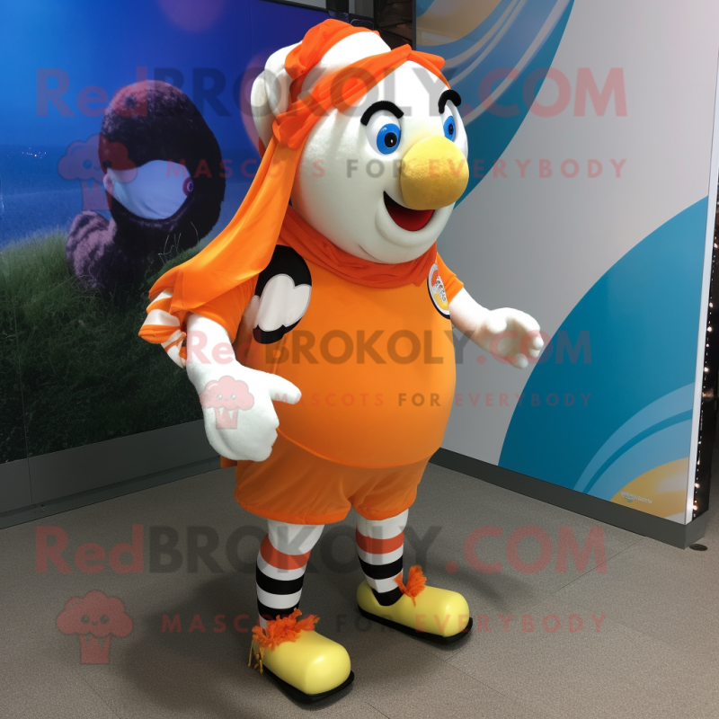 Cream Clown Fish mascot costume character dressed with a Running Shorts and Shawls