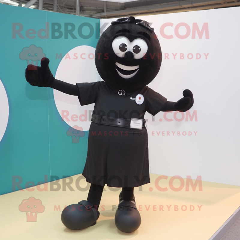 Black Handball Ball mascot costume character dressed with a Sheath Dress and Belts Black Handball Ball mascot costume character dressed with a Sheath Dress and Belts