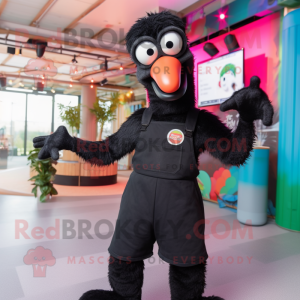 Black Flamingo mascot costume character dressed with a Dungarees and Gloves