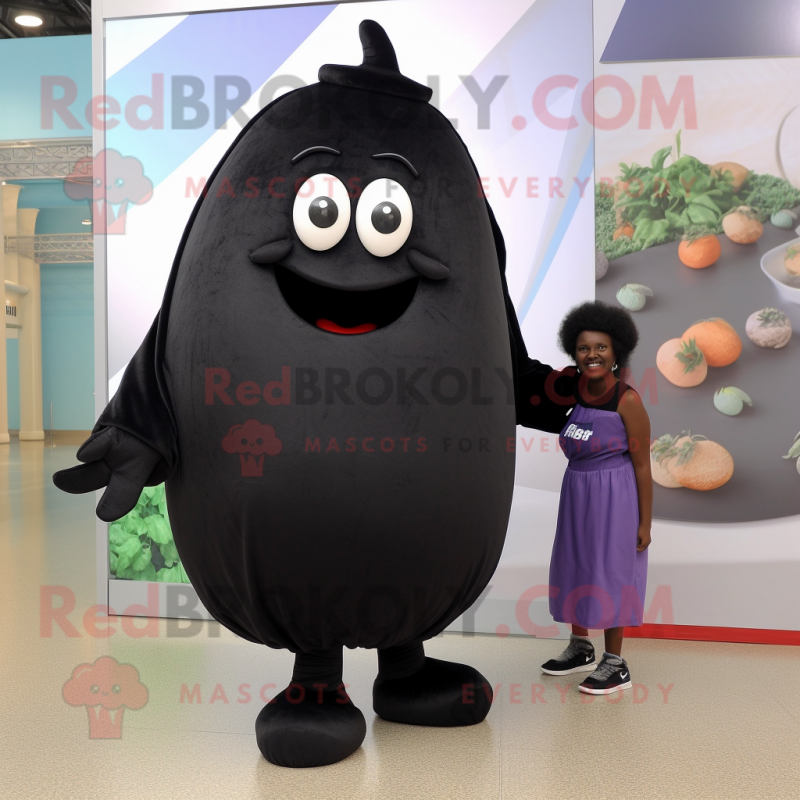 Black Potato mascot costume character dressed with a Romper and Cummerbunds Black Potato mascot costume character dressed with a Romper and Cummerbunds