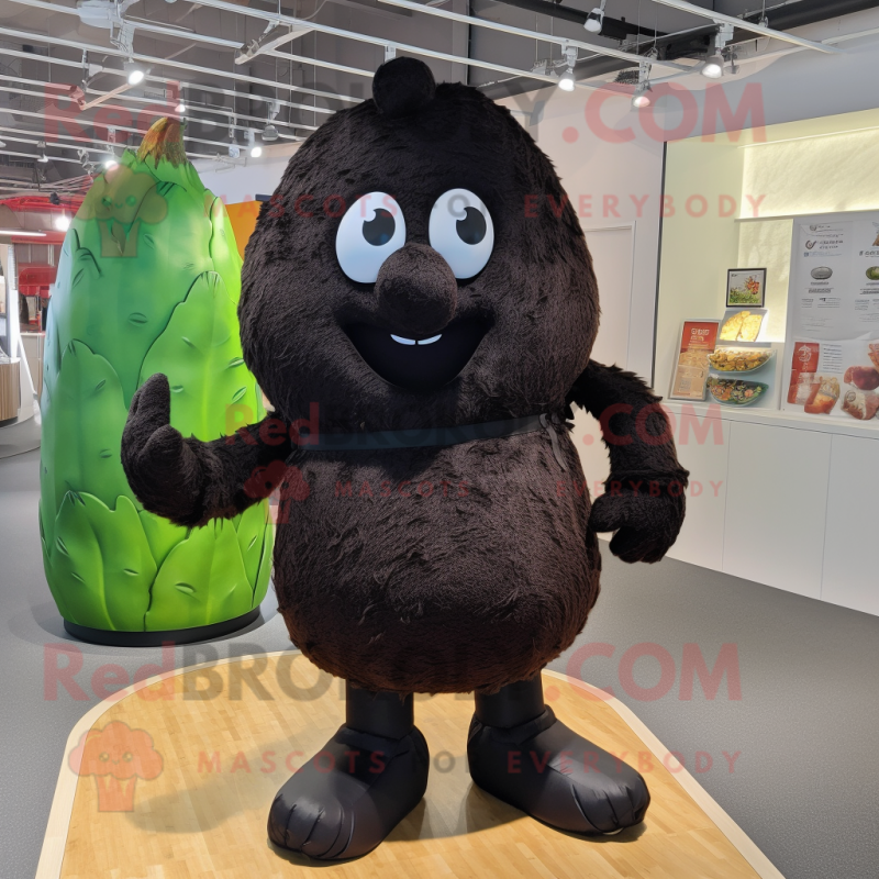 Black Potato mascot costume character dressed with a Romper and Cummerbunds Black Potato mascot costume character dressed with a Romper and Cummerbunds
