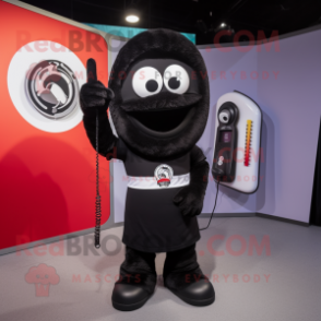 Black Phone mascot costume character dressed with a Polo Tee and Rings