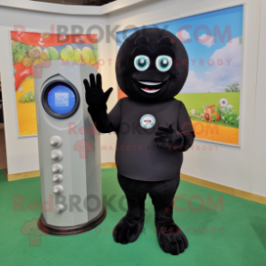 Black Phone mascot costume character dressed with a Polo Tee and Rings